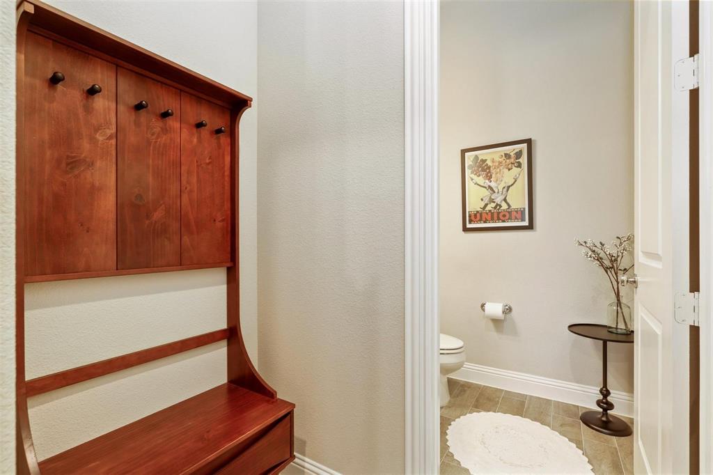 6246 Rilla Street Frisco, TX 75035 - Photo 9 of 26 a bathroom with a shower curtain