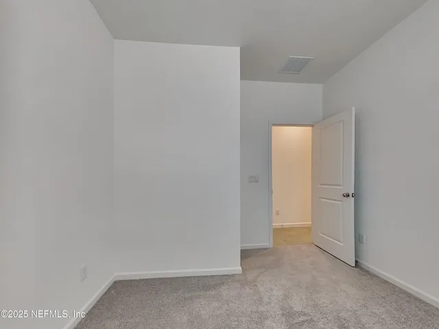 a view of a small space with a window