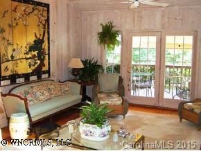 390 Winterset Trail Tryon, NC 28782 - Photo 7 of 8 a living room with furniture and a potted plant