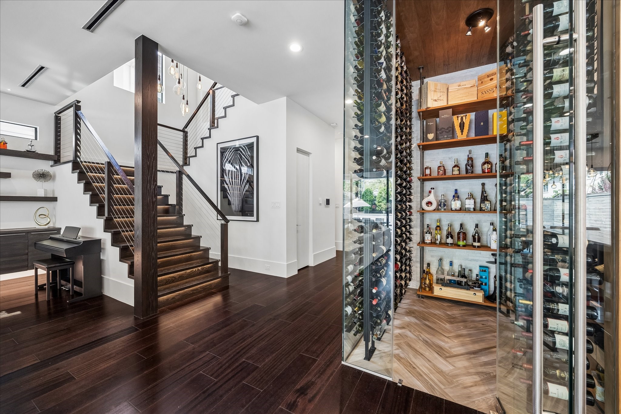 3814 Drake Street Houston, TX 77005 - Photo 15 of 50 Wine lovers take note! The custom glass wine room delivers a spectacular design focal point, along with gorgeous racks and shelves for more than 1,000 bottles.