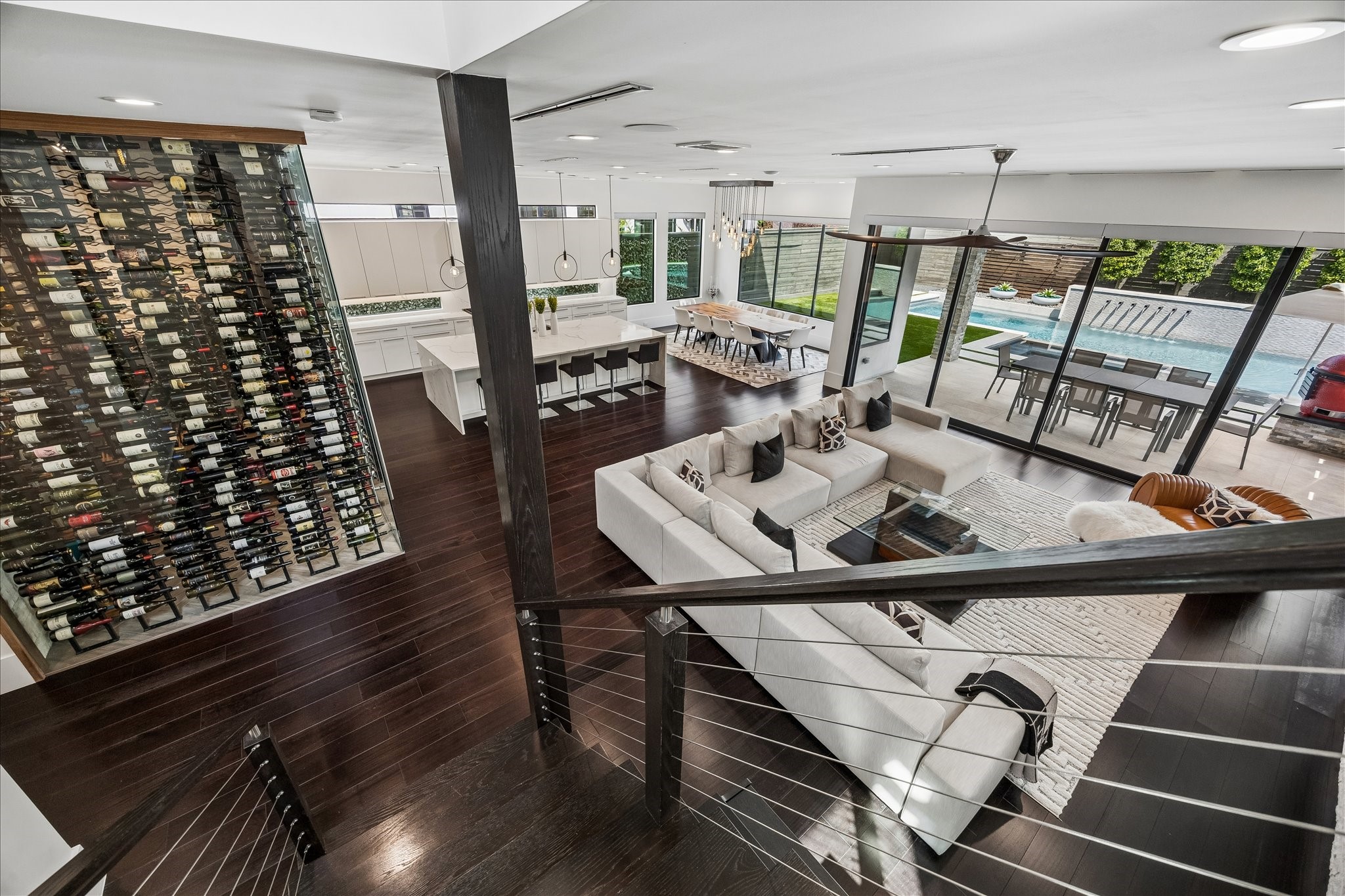 3814 Drake Street Houston, TX 77005 - Photo 2 of 50 The 4,570-square-foot home’s open layout amplifies natural light and outdoor views while creating an ideal backdrop for lavish entertaining and luxurious relaxation.