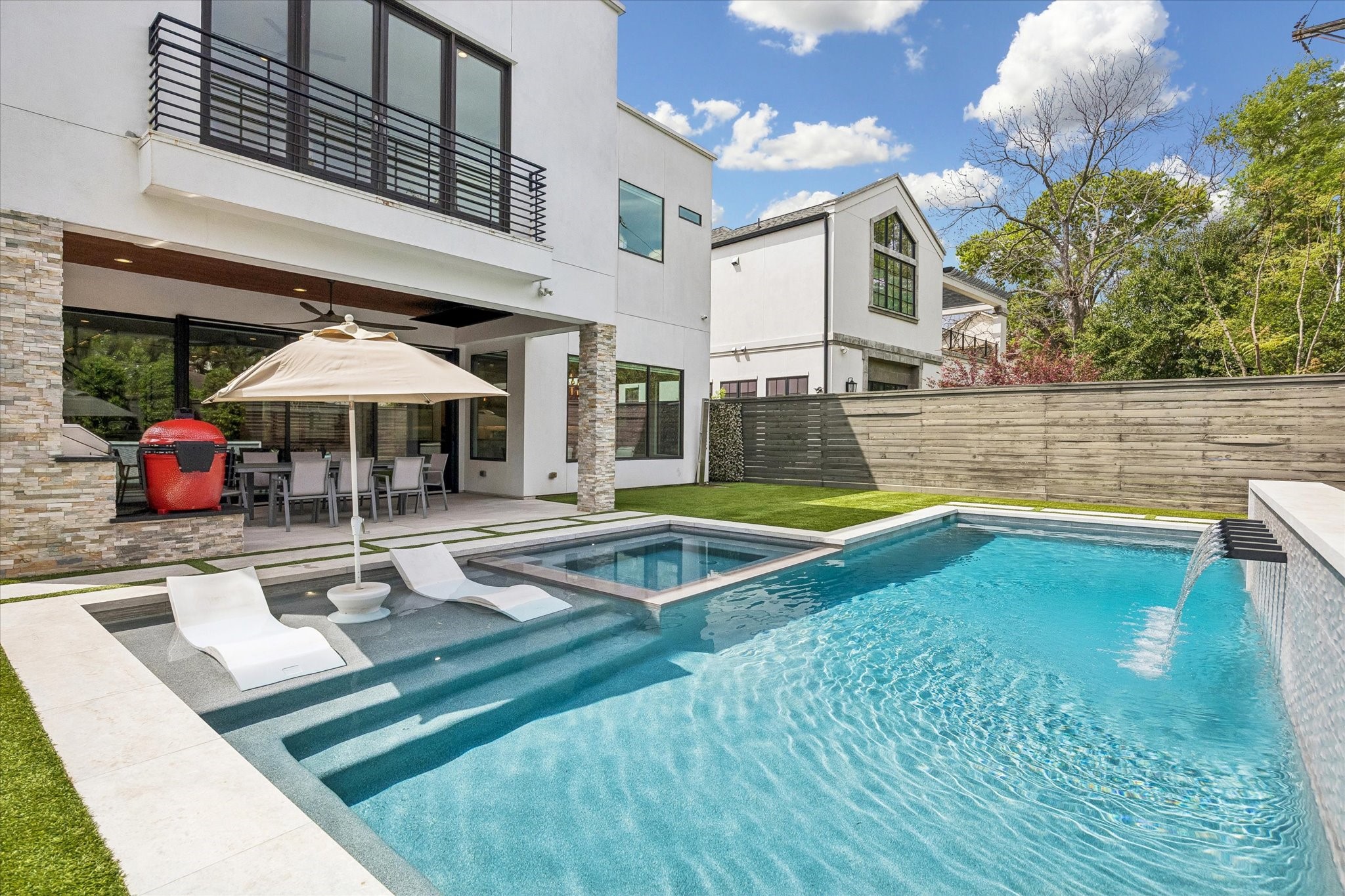 3814 Drake Street Houston, TX 77005 - Photo 24 of 50 The magazine-worthy outdoor oasis is anchored by a heated or chilled swimming pool and spa with smartphone-controlled Pentair equipment.