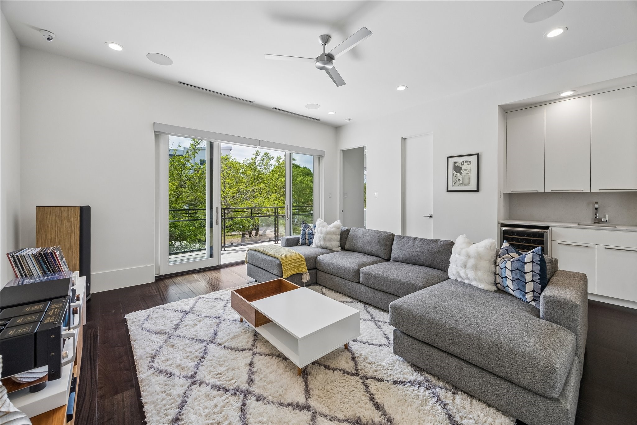 3814 Drake Street Houston, TX 77005 - Photo 31 of 50 An attached powder room, ceiling speakers and a wet bar make this a perfect space for cozy gatherings and epic movie nights.