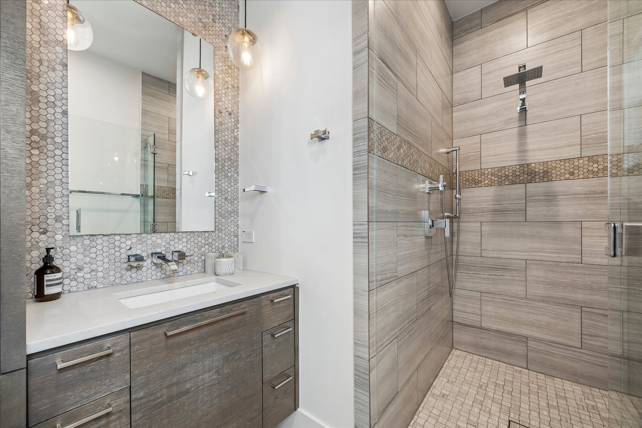3814 Drake Street Houston, TX 77005 - Photo 36 of 50 Enjoy an oversized rain shower, floating vanity and designer fixtures in this en suite spa bathroom.