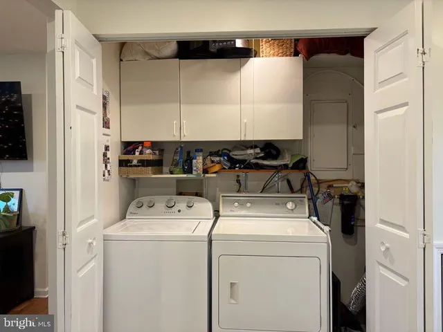 a utility room with dryer and washer