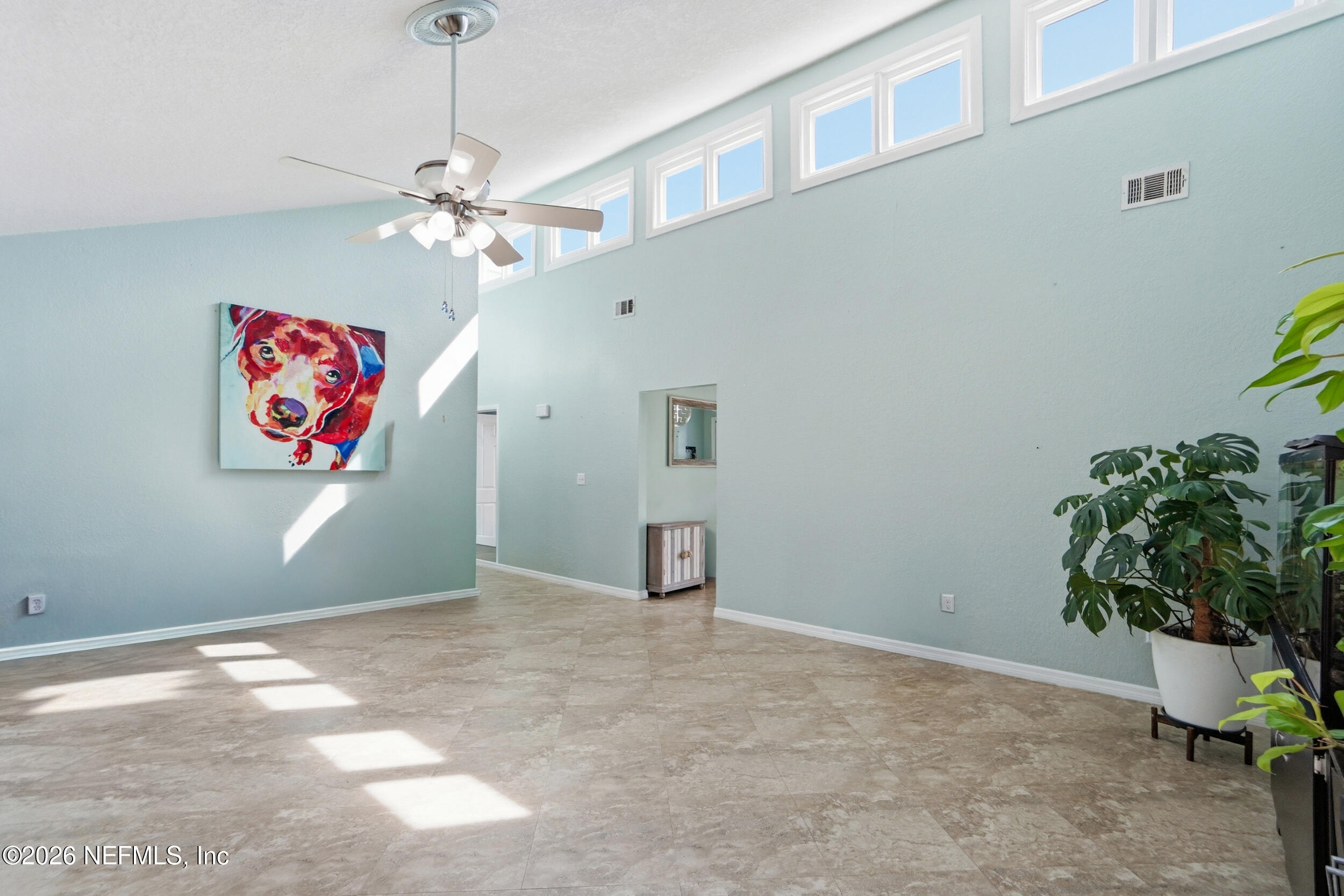 11108 Fairbanks Grant Road West Jacksonville, FL 32223 - Photo 11 of 34 a view of a livingroom with a potted plant