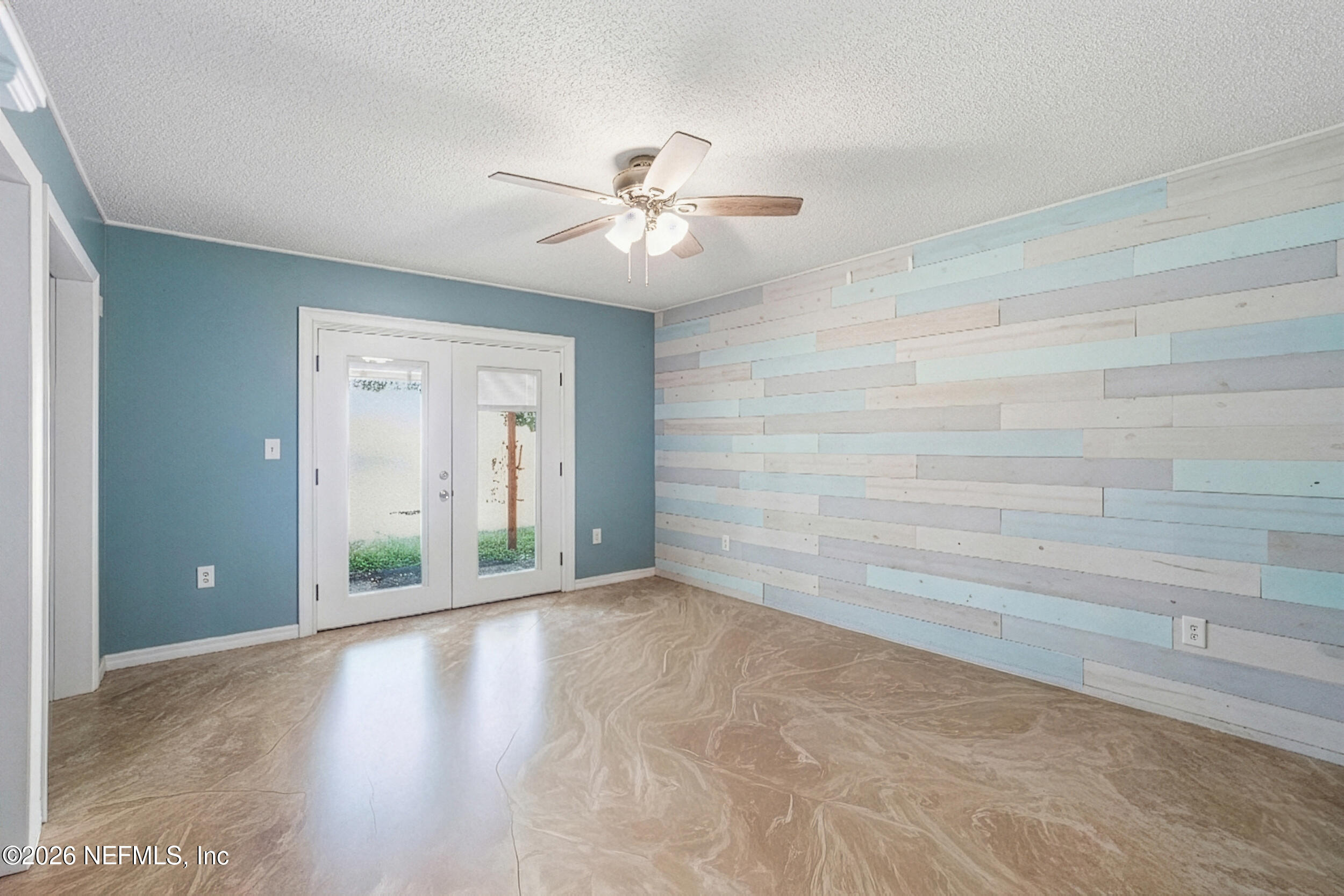 11108 Fairbanks Grant Road West Jacksonville, FL 32223 - Photo 19 of 34 wooden floor in an empty room with a window