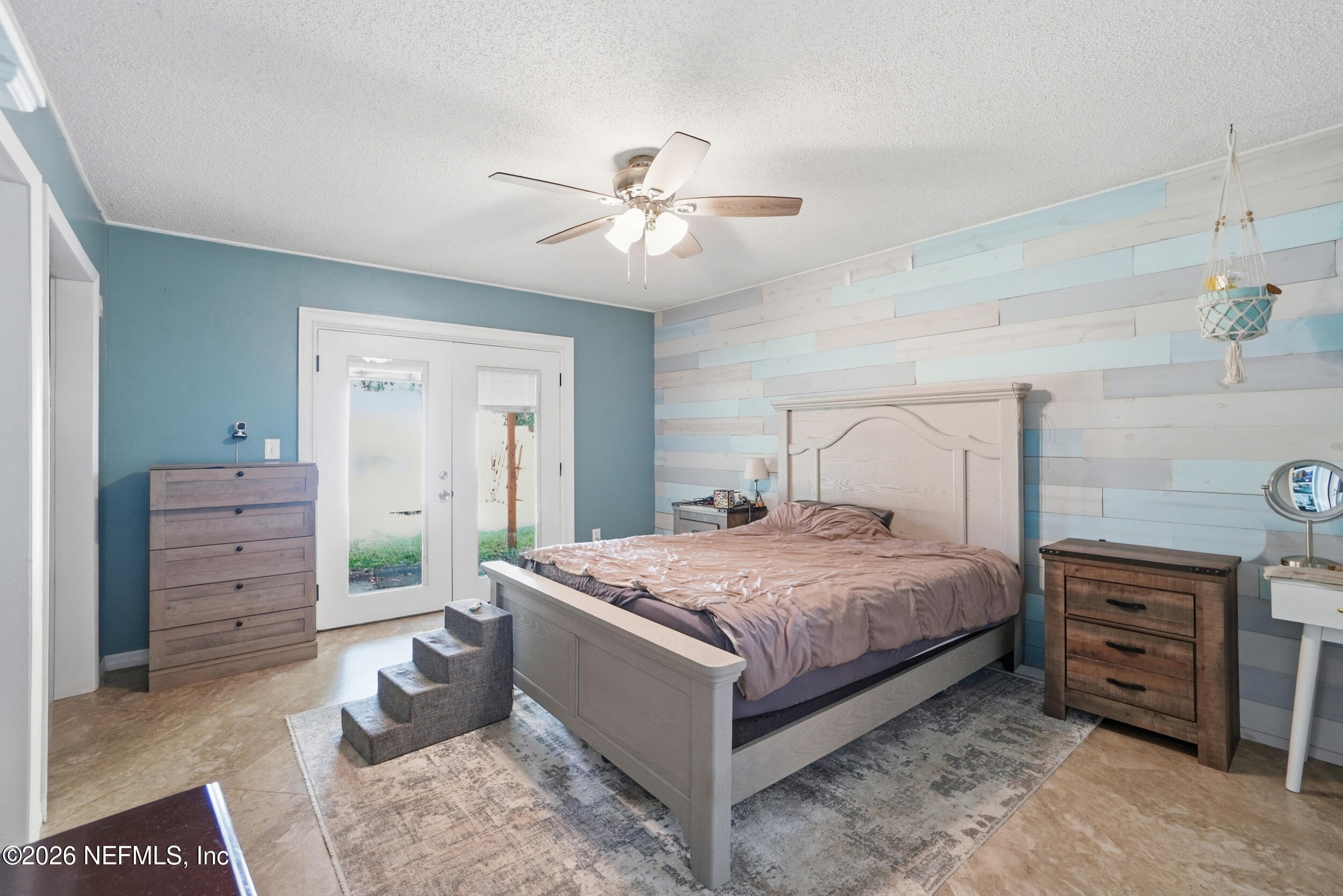 11108 Fairbanks Grant Road West Jacksonville, FL 32223 - Photo 20 of 34 a bedroom with a bed and a dresser