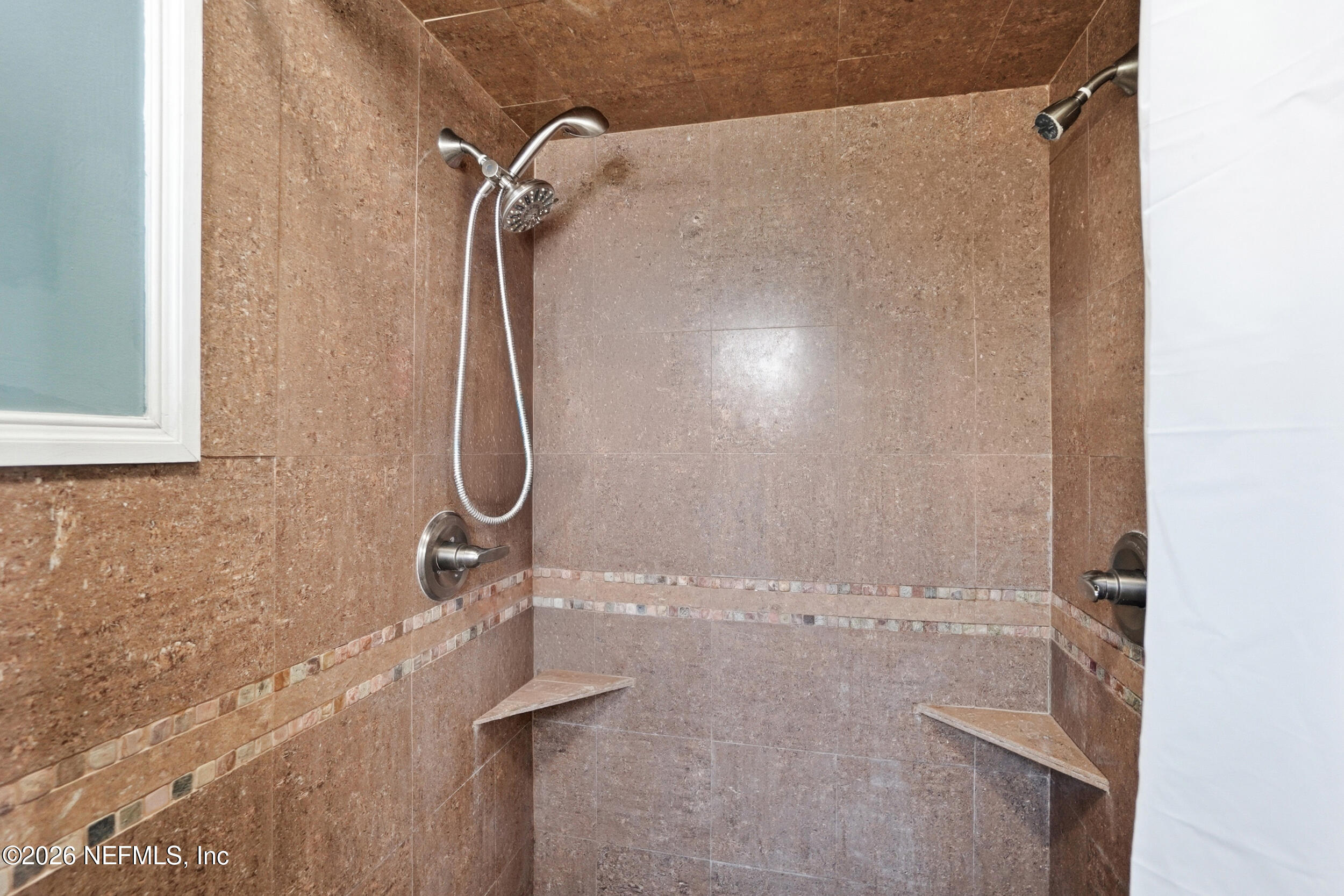 11108 Fairbanks Grant Road West Jacksonville, FL 32223 - Photo 23 of 34 a bathroom with a shower