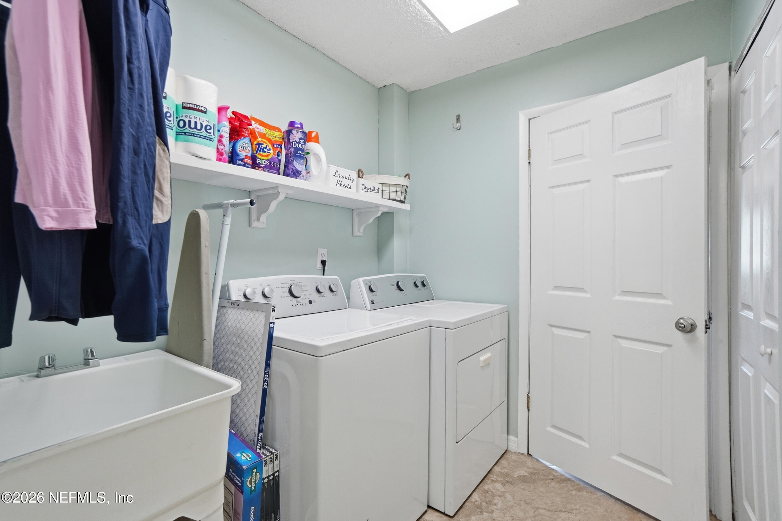 11108 Fairbanks Grant Road West Jacksonville, FL 32223 - Photo 28 of 34 a utility room with dryer and washer