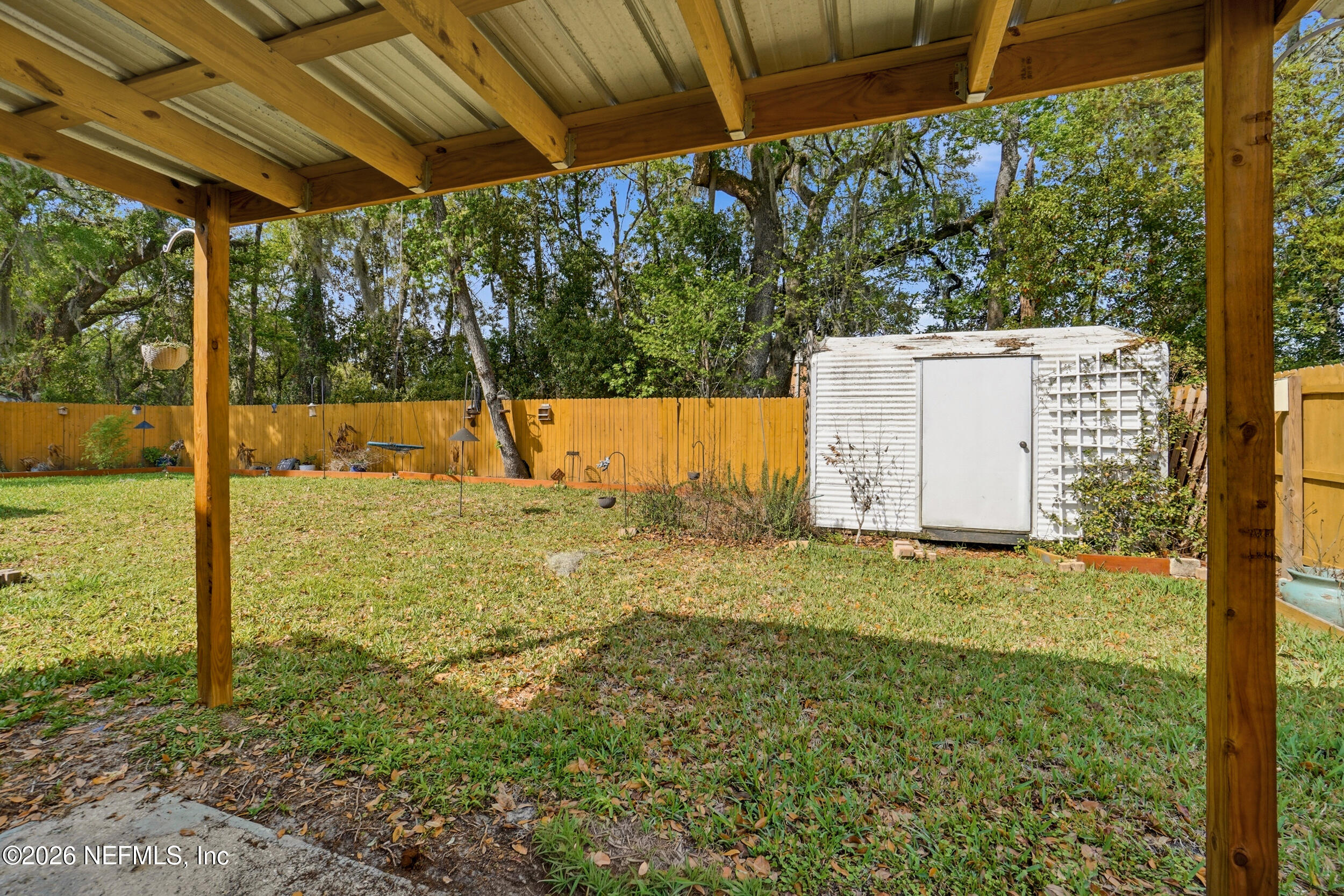 11108 Fairbanks Grant Road West Jacksonville, FL 32223 - Photo 32 of 34 a view of a backyard