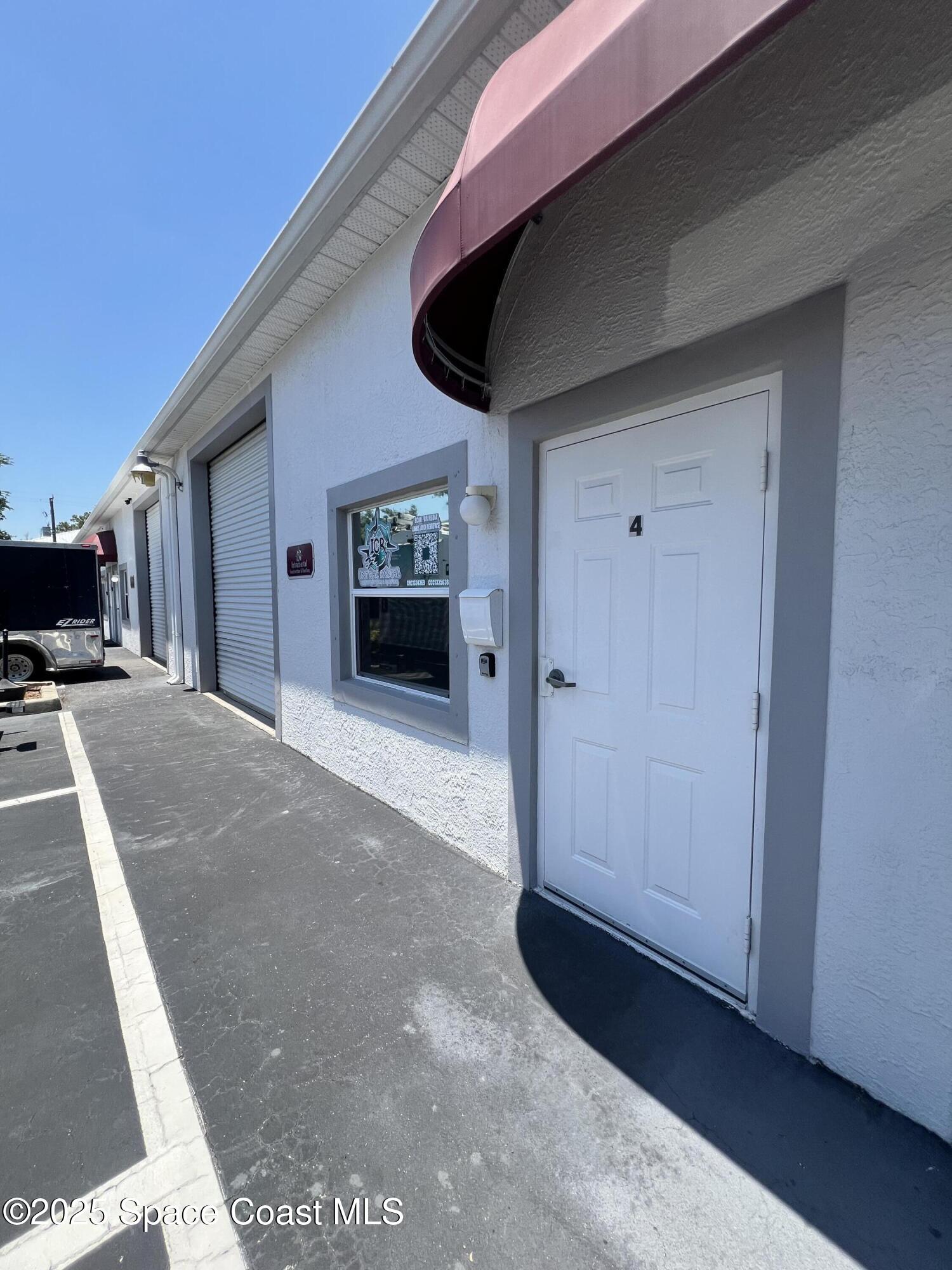 694 Atlantis Road, Unit 4 Melbourne, FL 32904 - Photo 2 of 14 IMG_3609
