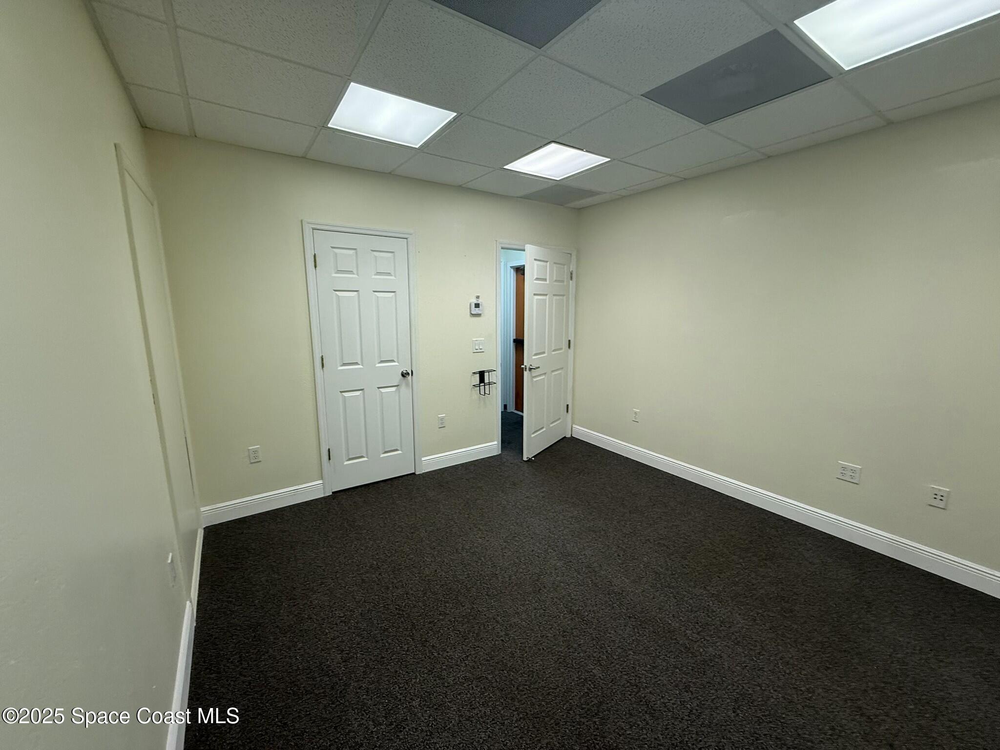 694 Atlantis Road, Unit 4 Melbourne, FL 32904 - Photo 9 of 14 43F4B807-61D3-4D6F-B4FB-07172875B964