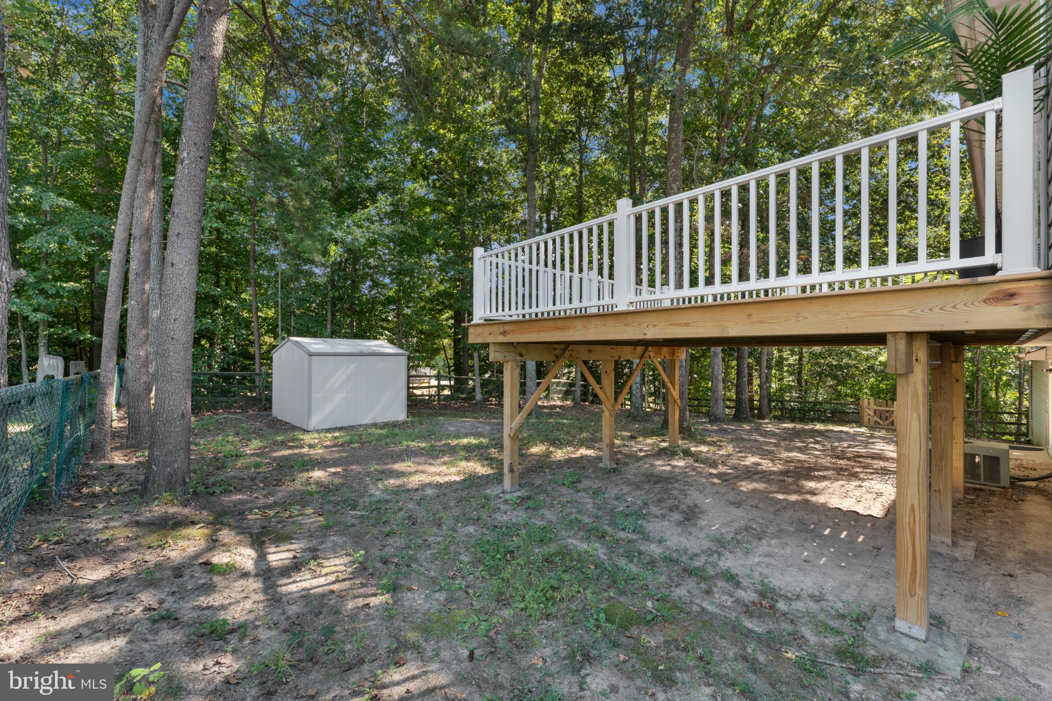 8507 Passapatanzy Road King George, VA 22485 - Photo 33 of 37 Serene backyard retreat with elevated deck.