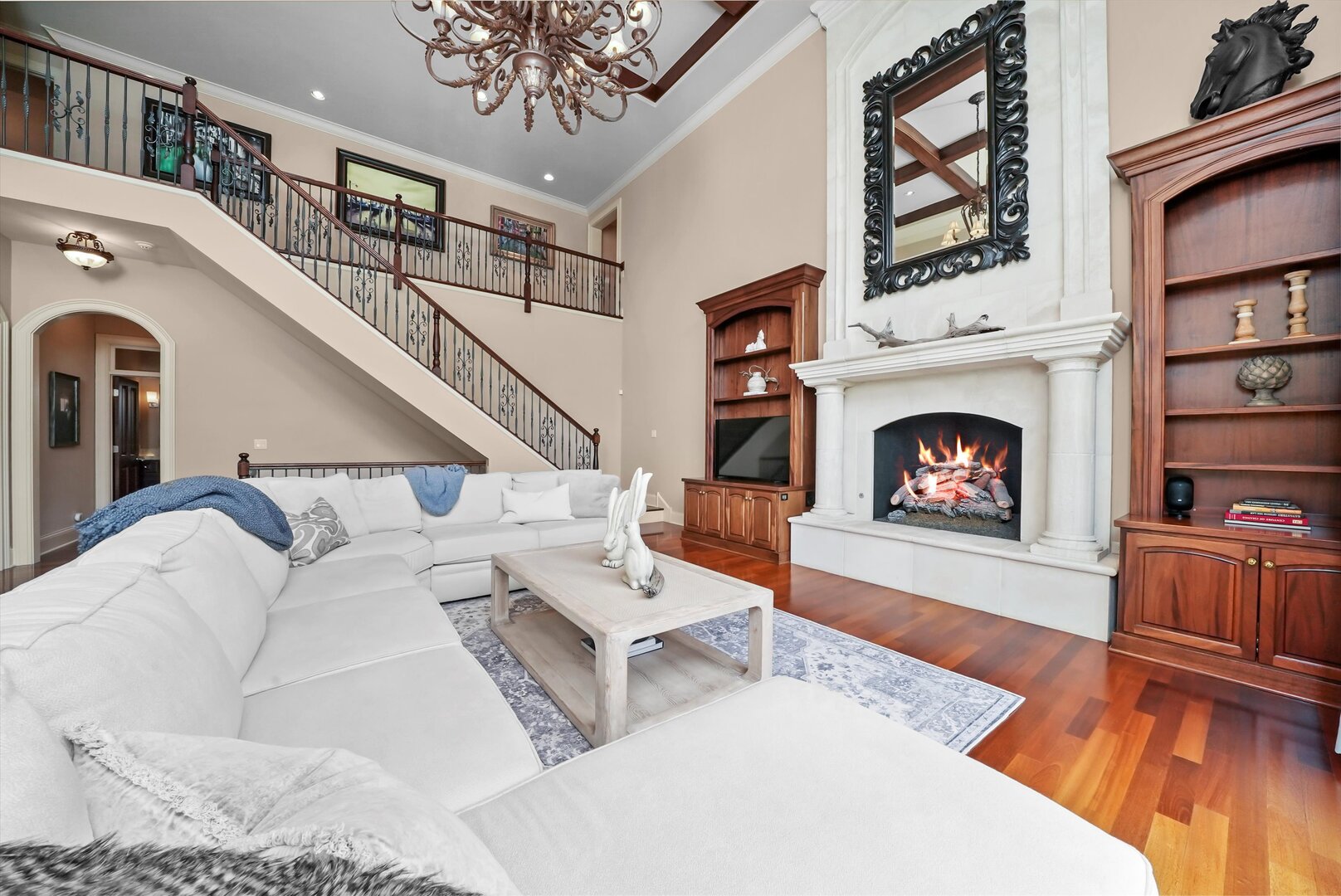 80 Geneva Court Inverness, IL 60010 - Photo 17 of 62 a living room with furniture and a fireplace
