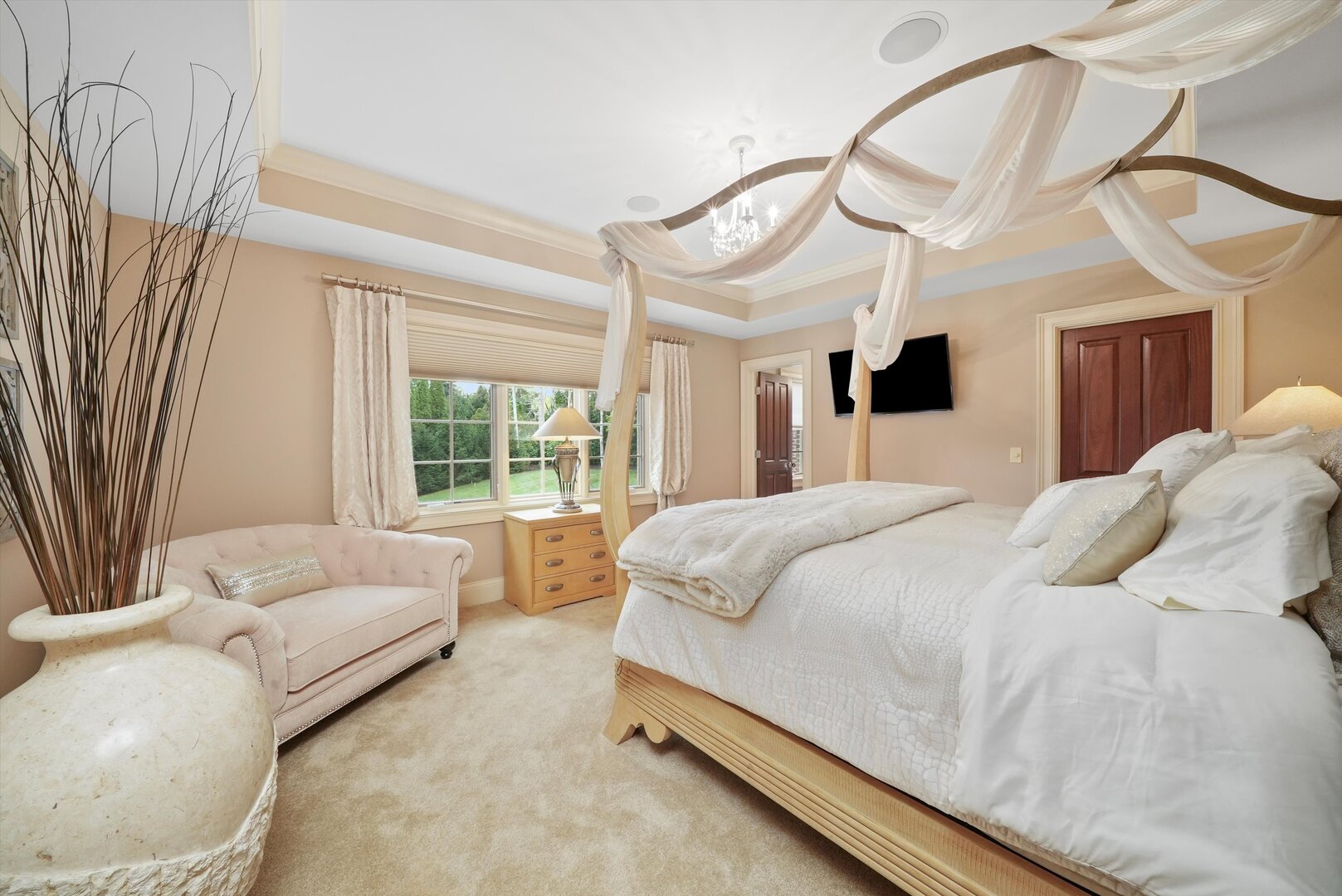 80 Geneva Court Inverness, IL 60010 - Photo 39 of 62 a spacious bedroom with a bed couch and a window