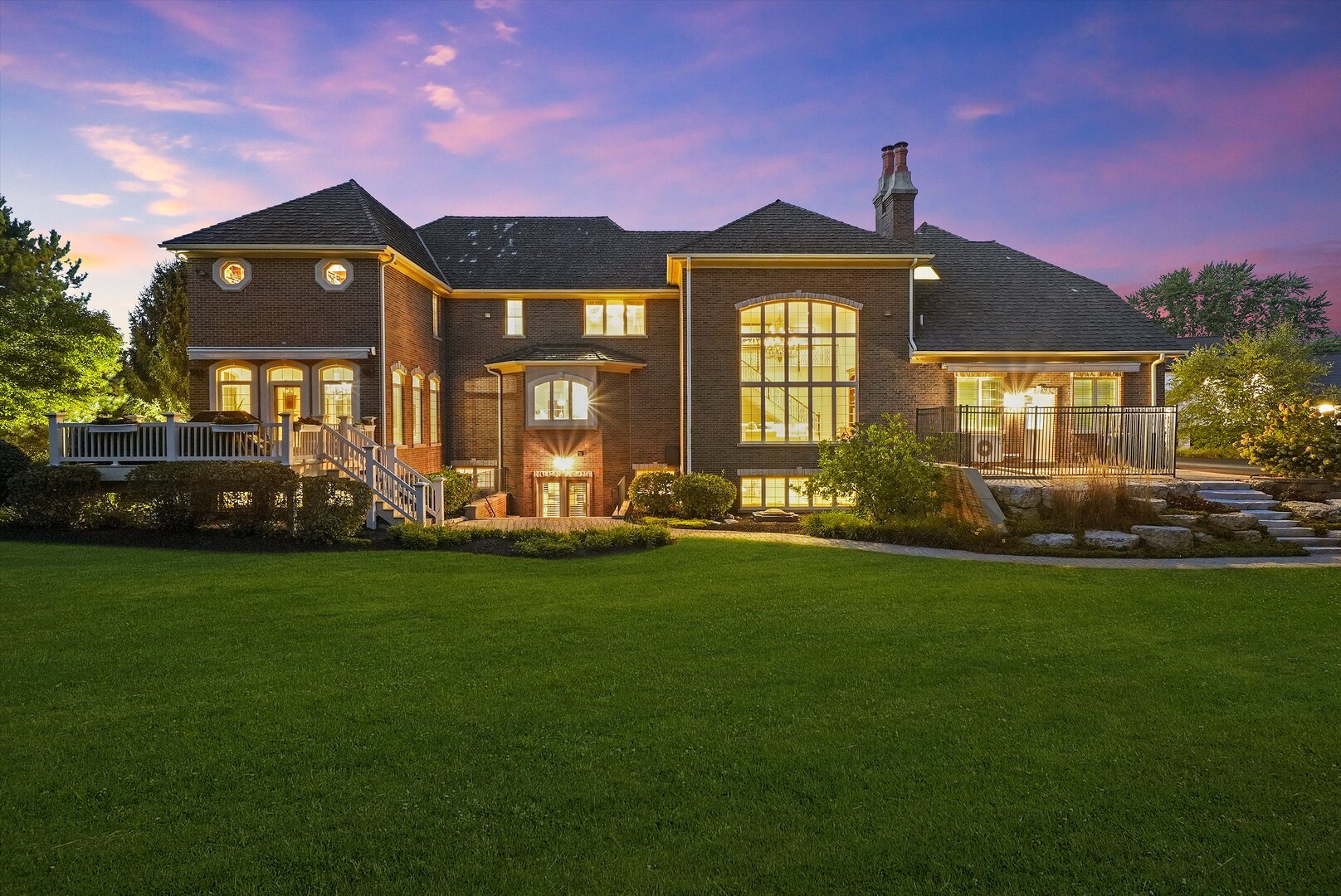 80 Geneva Court Inverness, IL 60010 - Photo 62 of 62 a front view of a house with a garden