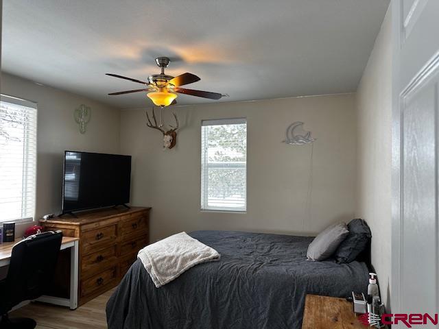 18469 Rd South Cortez, CO 81321 - Photo 11 of 34 a bedroom with bed and window