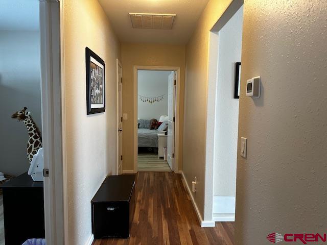 18469 Rd South Cortez, CO 81321 - Photo 13 of 34 a view of a bedroom from a hallway