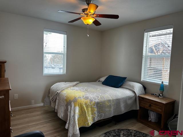 18469 Rd South Cortez, CO 81321 - Photo 31 of 34 a bedroom with a bed and a window