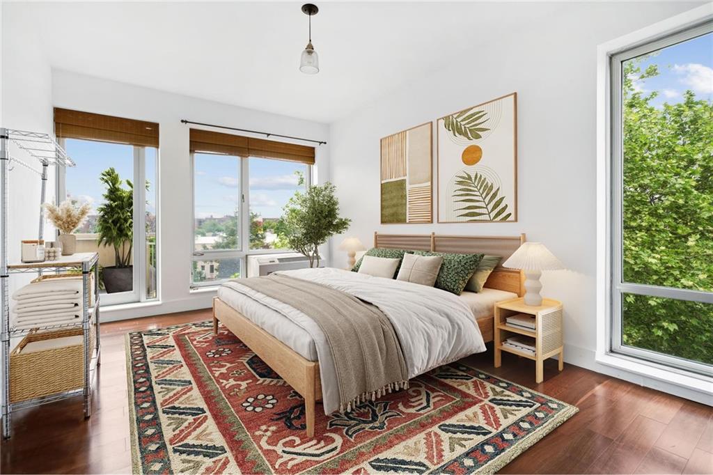 355 Stratford Road, Unit 5C Brooklyn, NY 11218 - Photo 4 of 12 a bedroom with a large bed and a window