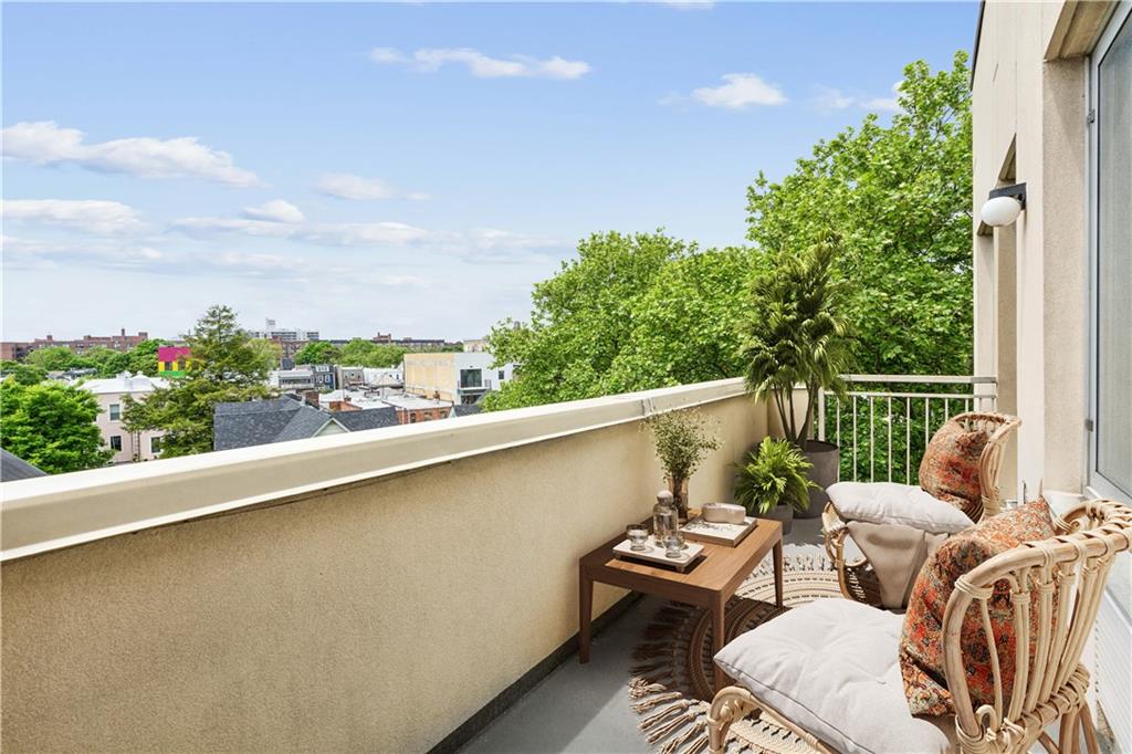 355 Stratford Road, Unit 5C Brooklyn, NY 11218 - Photo 8 of 12 a balcony with furniture and a potted plant