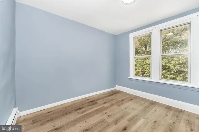 a view of a room that has a window in it