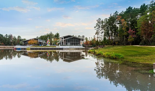 a swimming pool view with a lake view