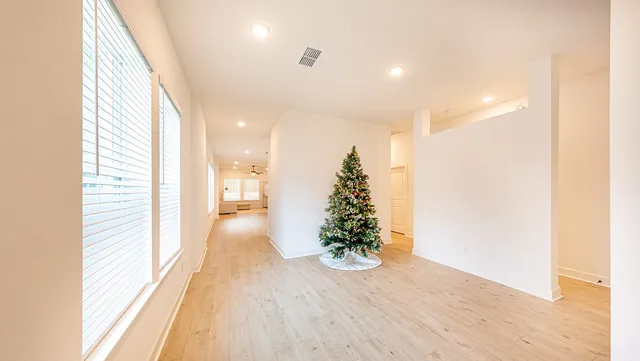 a view of entryway with wooden floor