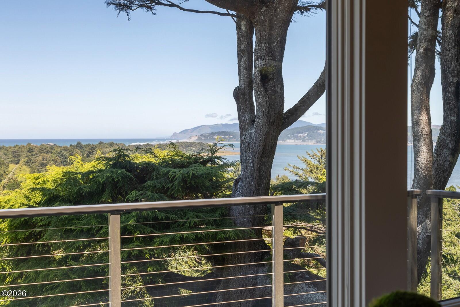 142 East Bay Point Road Gleneden Beach, OR 97388 - Photo 16 of 49 a view of a balcony with an outdoor space