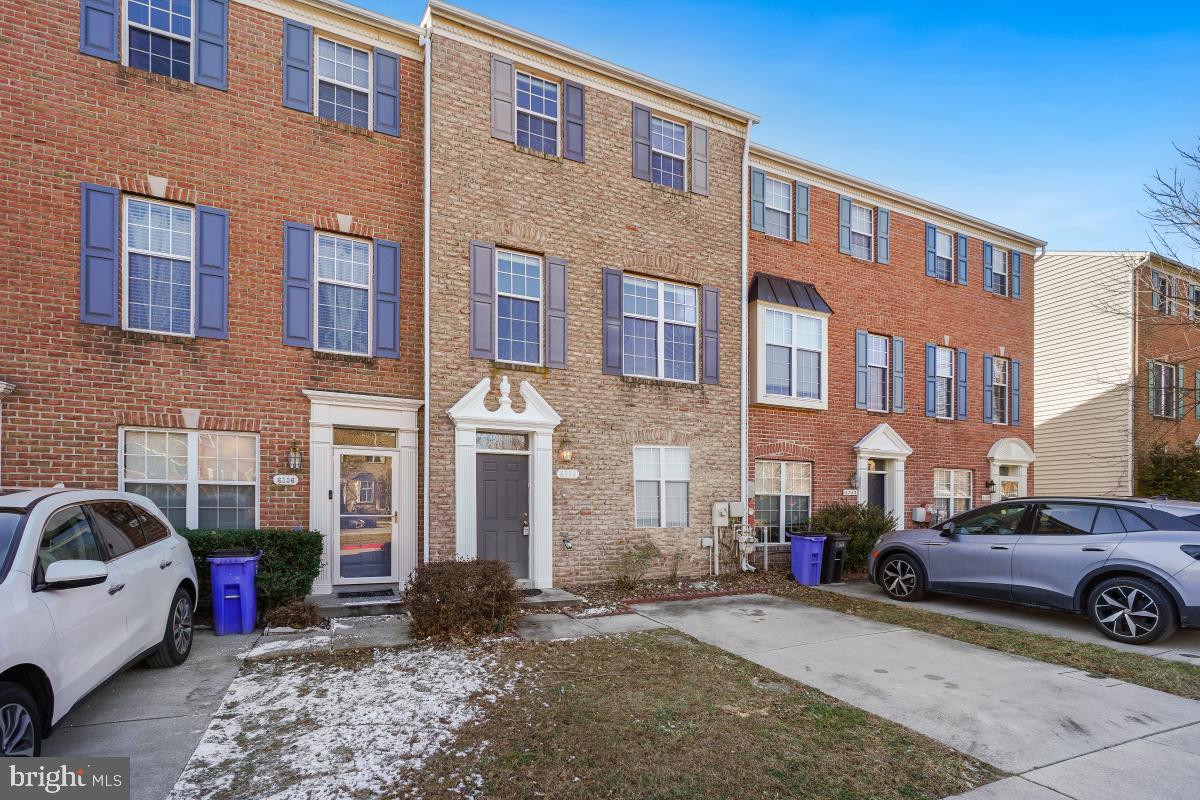 6334 Wind Rider Way Columbia, MD 21045 - Photo 2 of 45 a view of a car park in front of a building