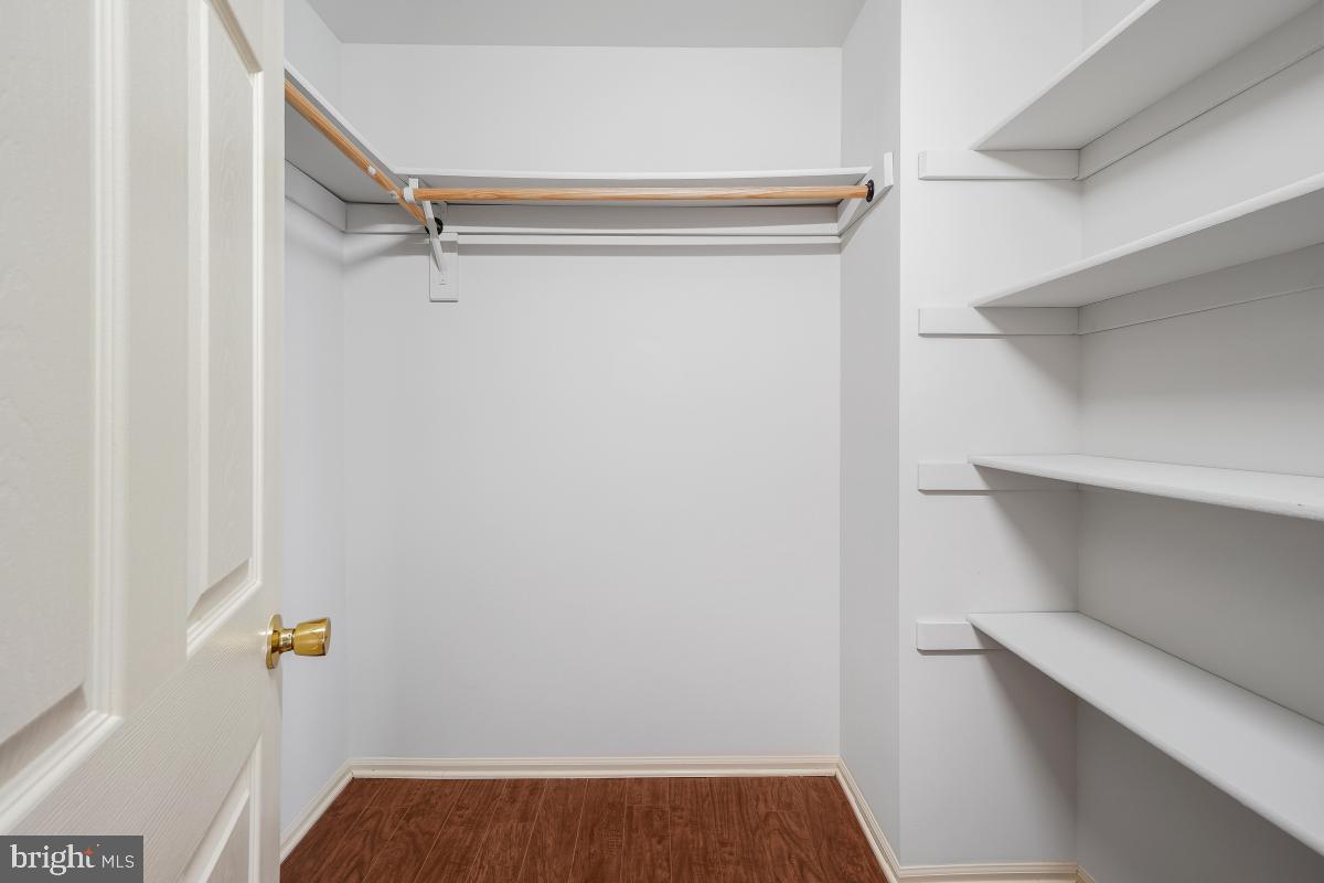 6334 Wind Rider Way Columbia, MD 21045 - Photo 35 of 45 a view of walk in closet with empty racks