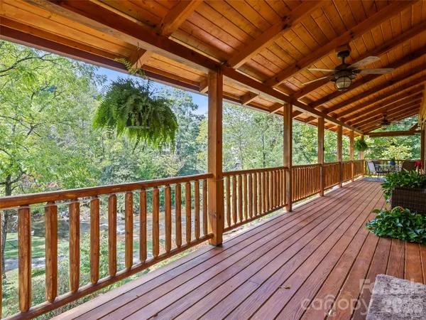 a porch with wooden floor in outdoor space