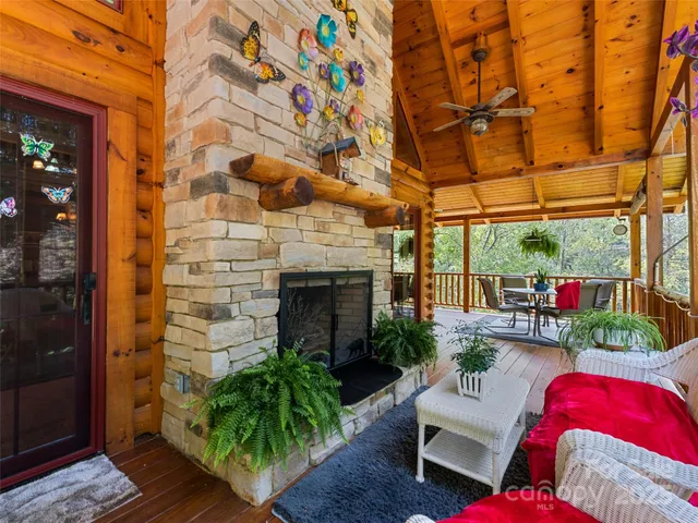 a view of a patio with couches and potted plants
