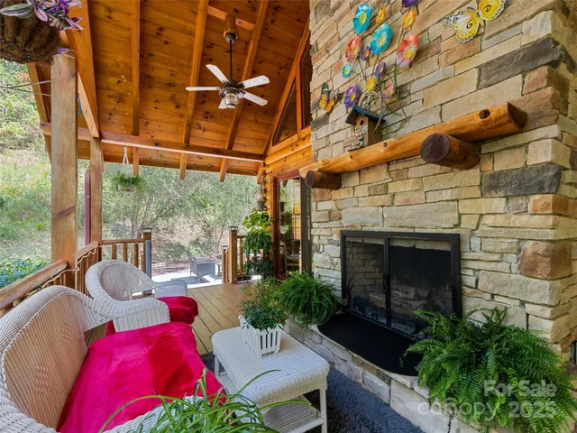 a building outdoor space with patio furniture and potted plants