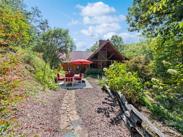 a view of street with sitting area and furniture