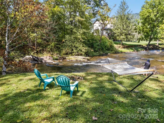 a view of a slide in a backyard