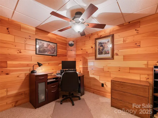 a view of a workspace with furniture