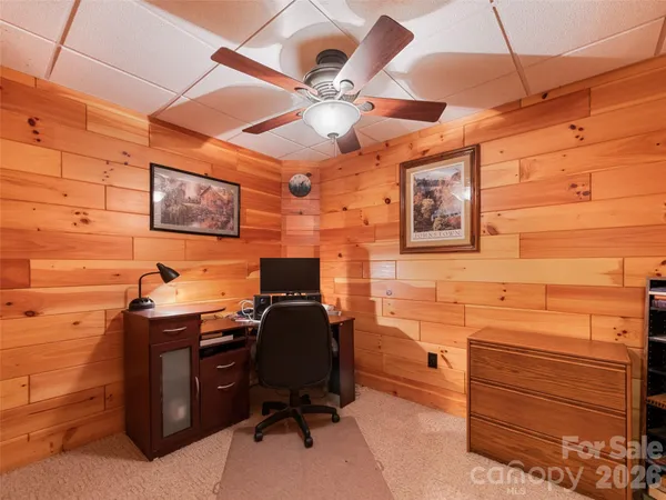a view of a workspace with furniture