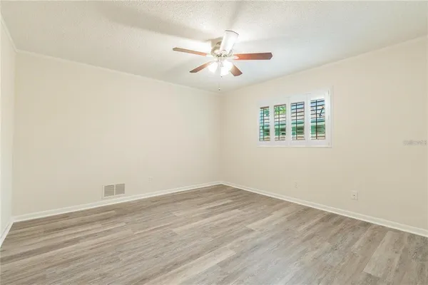a kitchen with stainless steel appliances granite countertop a stove a refrigerator and a microwave