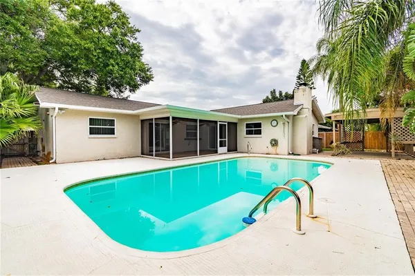 a view of a house with swimming pool