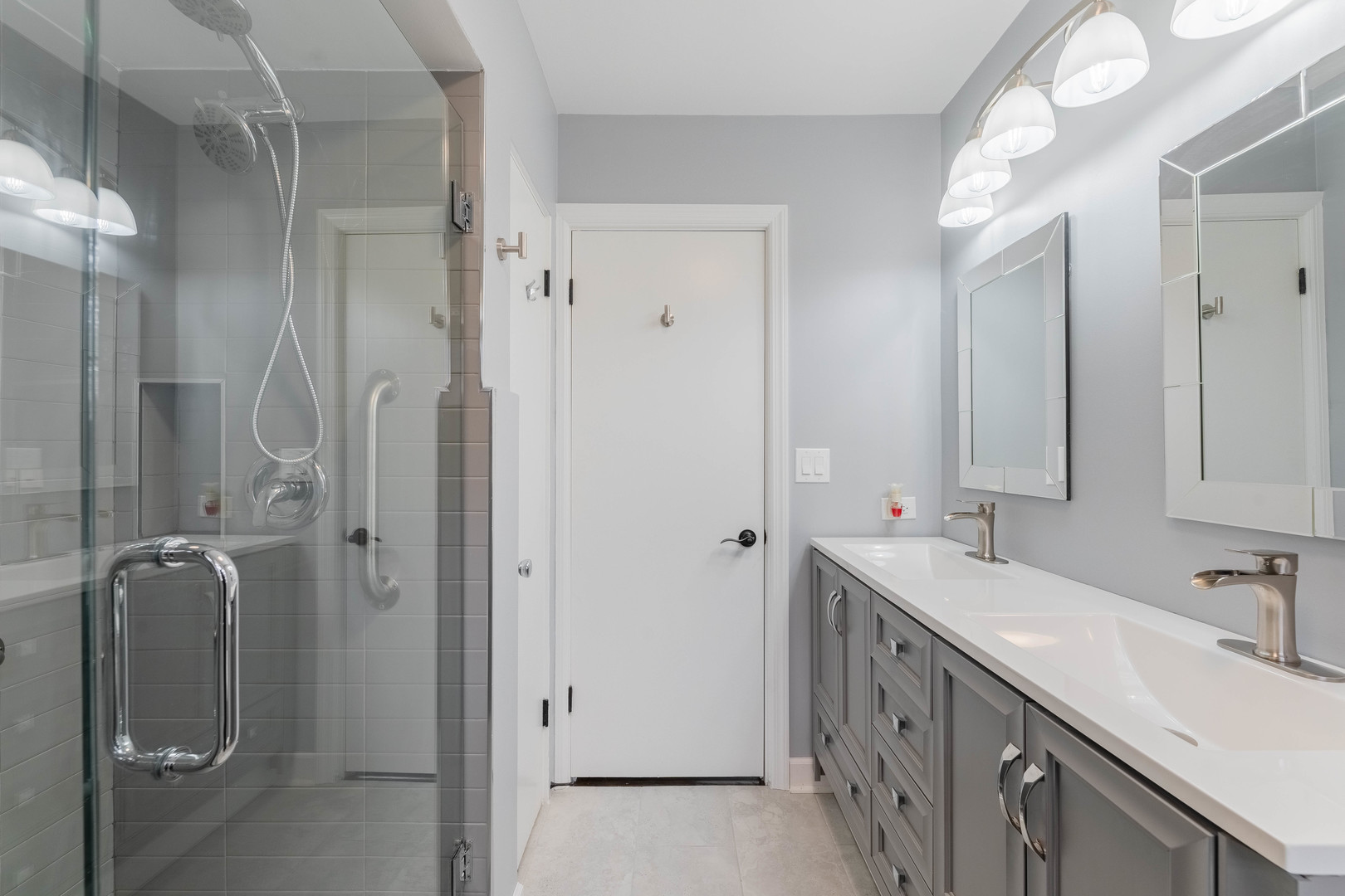 8000 Country Club Lane North Riverside, IL 60546 - Photo 19 of 41 a bathroom with a double vanity sink mirror and shower