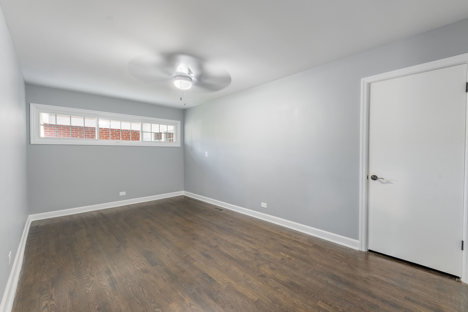 8000 Country Club Lane North Riverside, IL 60546 - Photo 24 of 41 an empty room with wooden floor and windows