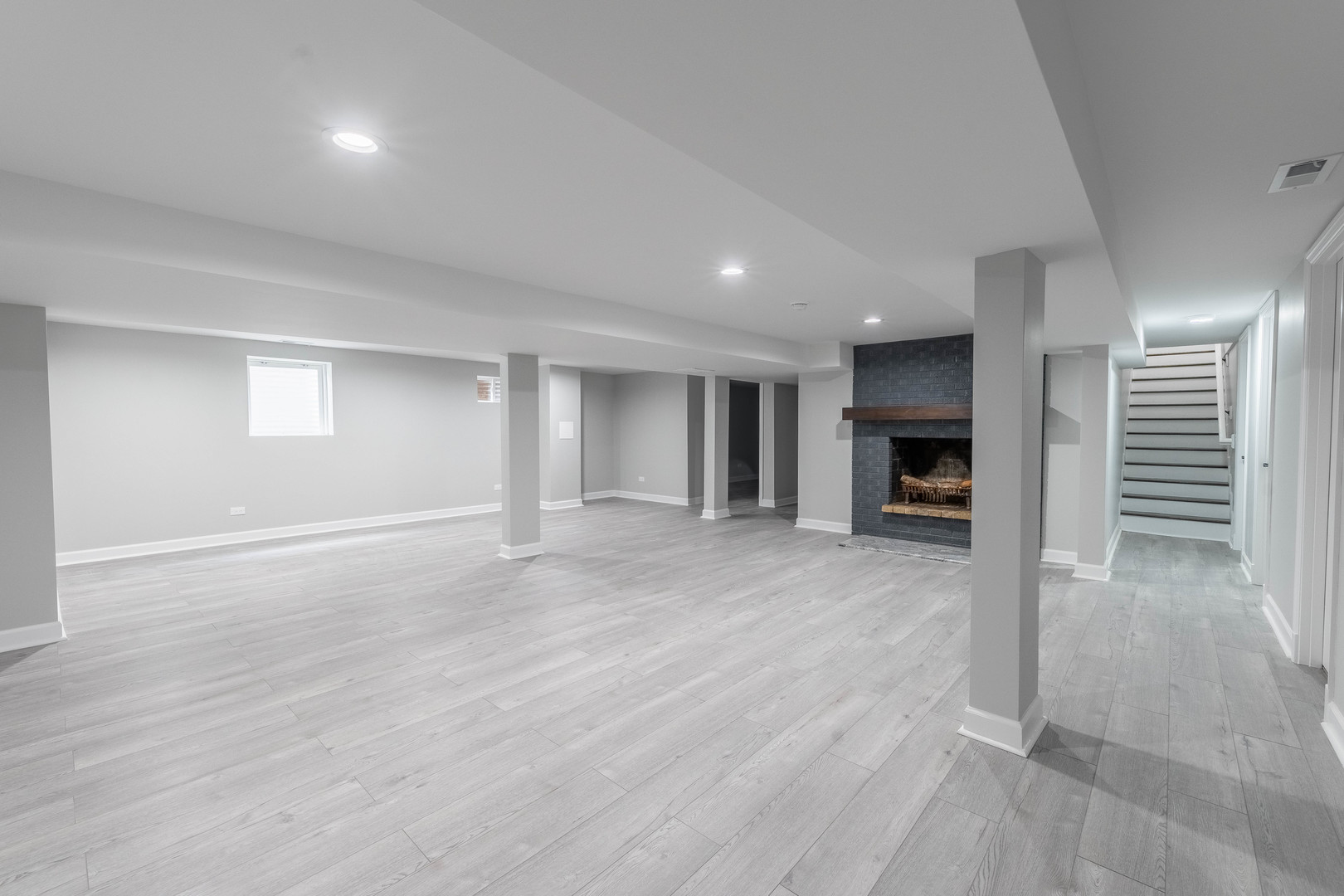 8000 Country Club Lane North Riverside, IL 60546 - Photo 25 of 41 an empty room with wooden floor kitchen view and a window