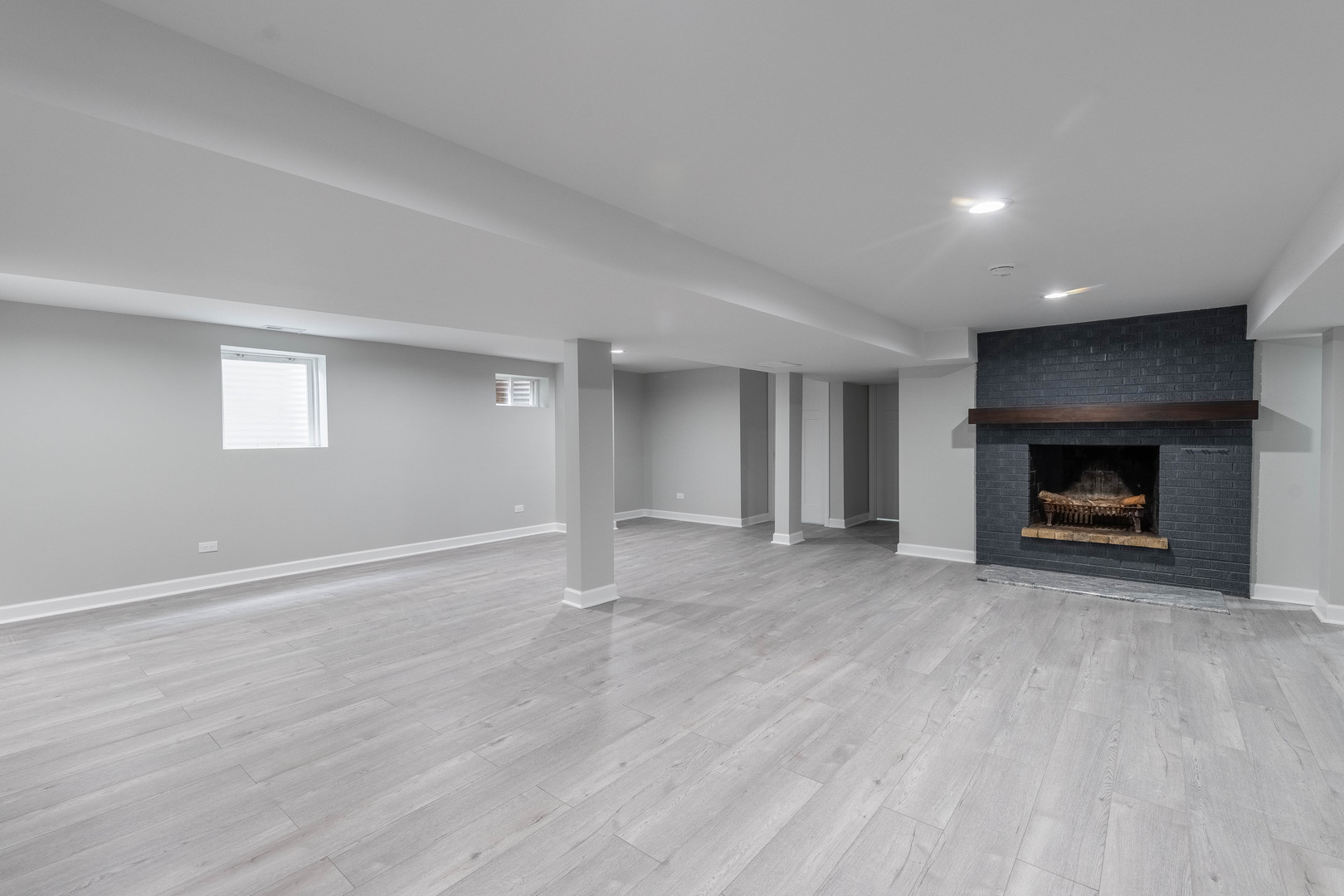8000 Country Club Lane North Riverside, IL 60546 - Photo 26 of 41 a view of an empty room with a fireplace and a window