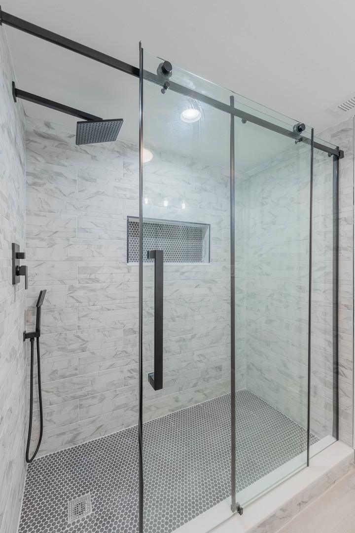 8000 Country Club Lane North Riverside, IL 60546 - Photo 32 of 41 a bathroom with a glass shower door