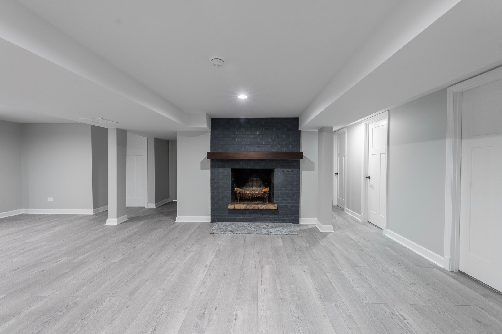 8000 Country Club Lane North Riverside, IL 60546 - Photo 35 of 41 a view of an empty room with wooden floor fireplace and a window