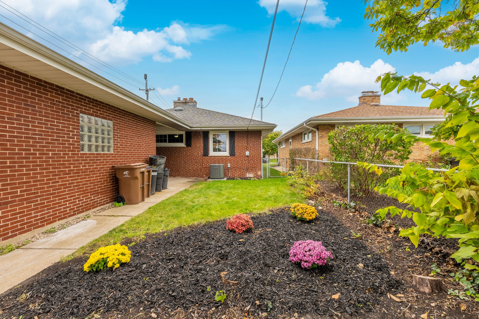 8000 Country Club Lane North Riverside, IL 60546 - Photo 40 of 41 a view of a backyard with table and chairs potted plants