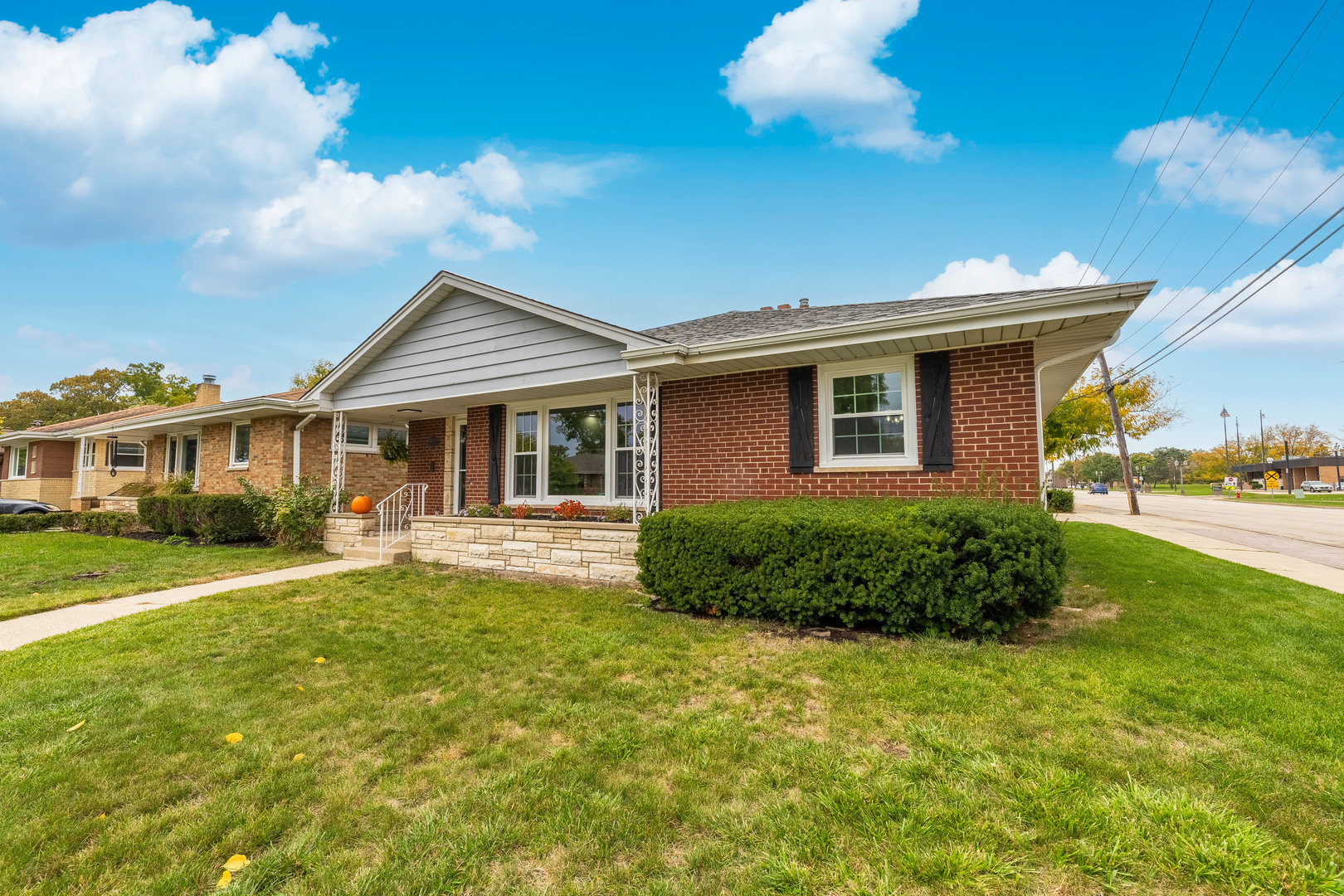 8000 Country Club Lane North Riverside, IL 60546 - Photo 4 of 41 a front view of a house with a yard and porch