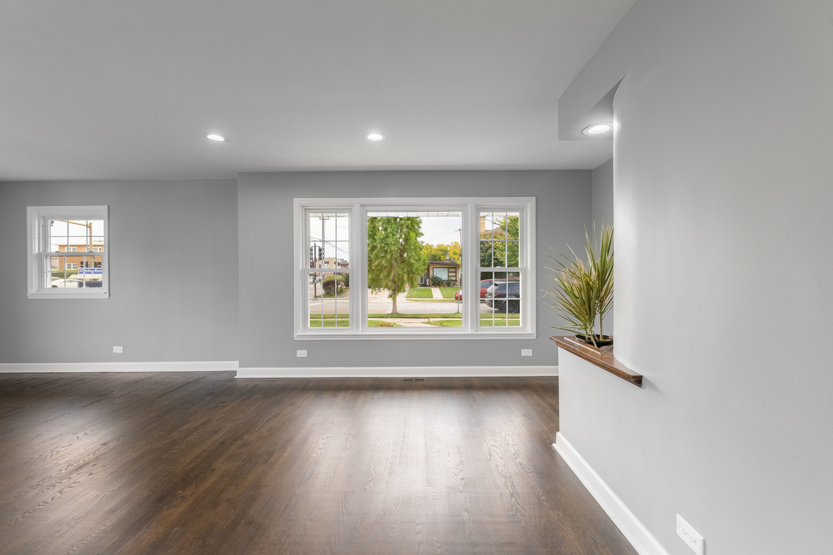 8000 Country Club Lane North Riverside, IL 60546 - Photo 8 of 41 an empty room with wooden floor and windows